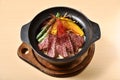 Sliced beef steak with fried vegetables cover rice Royalty Free Stock Photo