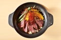 Sliced beef steak with fried vegetables cover rice Royalty Free Stock Photo
