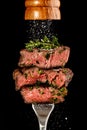Sliced beef steak from grill on a fork Royalty Free Stock Photo