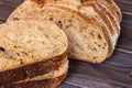 Sliced black bread on wooden table close-up Royalty Free Stock Photo