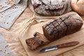 Sliced black bread on a wooden table Royalty Free Stock Photo