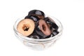 Sliced black olives on bowl isolated on the white Royalty Free Stock Photo