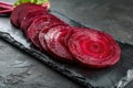 Sliced boiled beetroot on black background Royalty Free Stock Photo