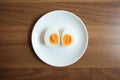 Sliced Boiled egg in white ceramic plate. Royalty Free Stock Photo