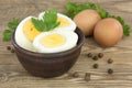 Sliced boiled eggs, with parsley leaves. Cooking a salad with boiled eggs Royalty Free Stock Photo