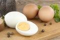 Sliced boiled eggs, with parsley leaves. Cooking a salad with boiled eggs Royalty Free Stock Photo