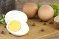 Sliced boiled eggs, with parsley leaves. Cooking a salad with boiled eggs Royalty Free Stock Photo