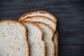 Sliced bread close up top view - Whole wheat bread cut on wooden dark