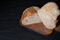 Sliced bread on cutting board. Slices of grain bread Royalty Free Stock Photo