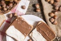 Sliced bread in plate with chocolate cream and nuts Royalty Free Stock Photo