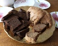 Sliced breads put on wooden plate,wholewheat breads lay on wood plate and put on sackcloth,whole wheat breads Royalty Free Stock Photo