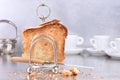 Sliced brown bread in silver antique rack toasted breakfast time