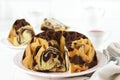 Sliced of Bundt Marble Cake on White Table Royalty Free Stock Photo