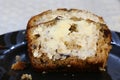 Sliced and buttered banana bread