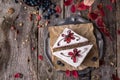 Sliced cake with wild berries and chocolate. Royalty Free Stock Photo