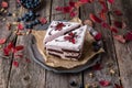 Sliced cake with wild berries and chocolate. Royalty Free Stock Photo