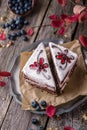 Sliced cake with wild berries and chocolate. Royalty Free Stock Photo