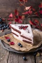 Sliced cake with wild berries and chocolate. Royalty Free Stock Photo