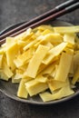 Sliced canned bamboo shoots on plate
