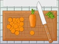 Sliced carrot, next to a knife on a chopping board