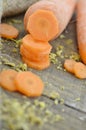 Sliced carrot on wooden table was taken from a rather unusual angle