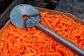 Sliced carrots for Uzbek pilaf. Cooking national food. Carrot sliced into wedges.