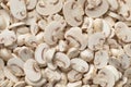 Sliced champignons, Button mushrooms,close up full frame as background