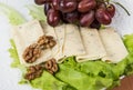 Sliced cheese salad and grapes walnut Royalty Free Stock Photo