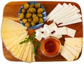 Sliced cheese served with honey and olives Royalty Free Stock Photo