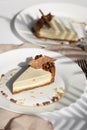 Sliced Cheesecake. Layer of biscuits, mousse based on creamcheese, with chocolate cream. Healthy dessert. Royalty Free Stock Photo