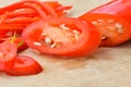 Sliced Chili Pepper on wooden chopping board Royalty Free Stock Photo