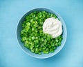 Sliced green onions or scallions in a bowl Royalty Free Stock Photo