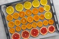 Sliced citrus on baking sheet Royalty Free Stock Photo