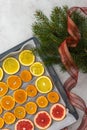 Sliced citrus on baking sheet Royalty Free Stock Photo