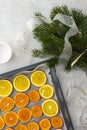 Sliced citrus on baking sheet Royalty Free Stock Photo