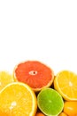 Sliced citrus fruit on the white isolated background Royalty Free Stock Photo