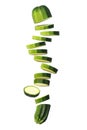 Sliced Courgette (Zucchini) Flying on White