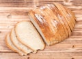 Sliced crusty country style round organic french bread Royalty Free Stock Photo