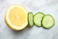 Sliced cucumber and lemon pieces Royalty Free Stock Photo