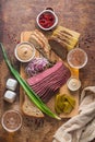 Sliced Deli Pastrami on wooden board, flat lay