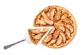 Sliced delicious apple pie and spatula on white background, top view Royalty Free Stock Photo