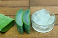 sliced and diced aloe vera on wooden background