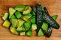 A sliced and diced Avocado with the skin removed and present, st