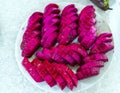 Sliced dragon fruit arranged on a plate in the buffet