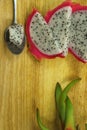 Sliced dragon fruit on cutting board