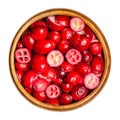 Sliced and dried cranberries in a wooden bowl Royalty Free Stock Photo