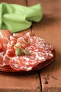 Sliced dried sausage meat (ham, prosciutto, salami) Royalty Free Stock Photo