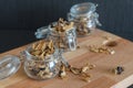 Sliced and dried various mushrooms in three preserving glass bow