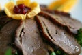 Sliced duck and greens