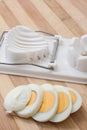 Sliced egg on the egg chopper Royalty Free Stock Photo